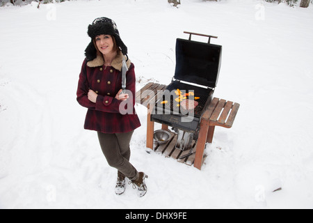 TV personality e celebrity chef Ceci Carmichael prepara una estrema inverno barbecue Foto Stock