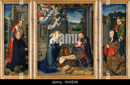 La Natività con i donatori e i Santi Girolamo e Leonard - da Gerard David, 1515 Foto Stock