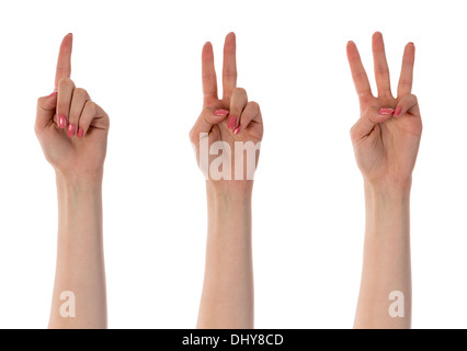 Conteggio di tre mani femminili isolato su bianco Foto Stock