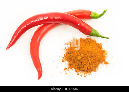 Red Hot Pepper pod sabbia una manciata di macinato Foto Stock