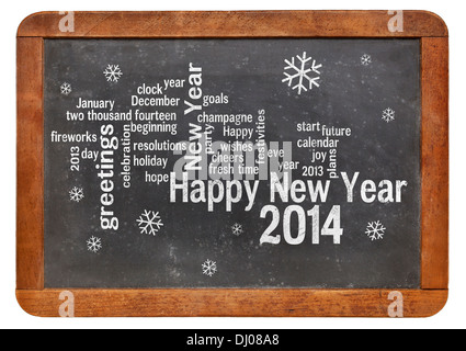 Felice Anno Nuovo 2014 word cloud - bianco gesso di testo su un vintage lavagna ardesia Foto Stock