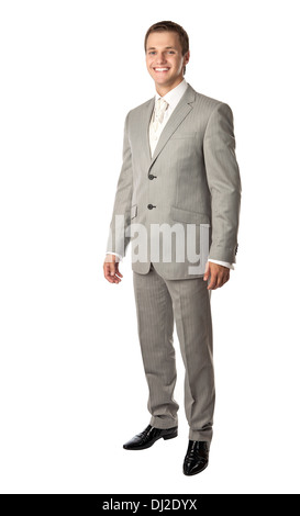 Lunghezza completa di un giovane uomo in una tuta luminosamente sorridente Foto Stock
