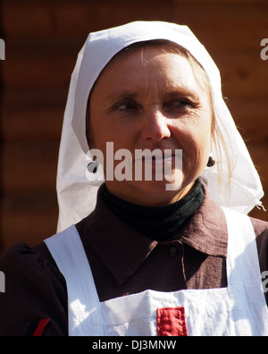La donna nell'uniforme di infermiere del periodo della Guerra Mondiale prima . Foto Stock