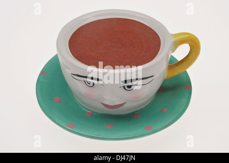 Cina/ceramica tazza da tè con volto sorridente. Foto Stock