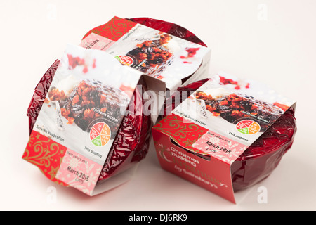 Tre singole porzione pudding di Natale da Sainsbury Foto Stock