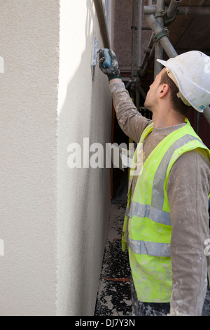 Il rendering di una parete esterna del sistema di isolamento EWI come parte dei governi del Regno Unito Energia Obbligo della società ECO Foto Stock