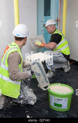 Il rendering di una parete esterna del sistema di isolamento EWI come parte dei governi del Regno Unito Energia Obbligo della società ECO Foto Stock