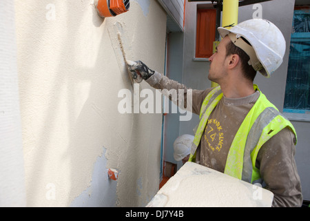 Il rendering di una parete esterna del sistema di isolamento EWI come parte dei governi del Regno Unito Energia Obbligo della società ECO Foto Stock