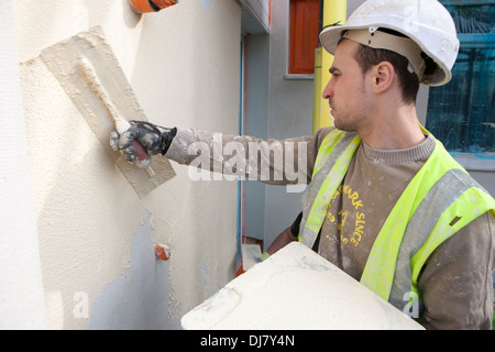 Il rendering di una parete esterna del sistema di isolamento EWI come parte dei governi del Regno Unito Energia Obbligo della società ECO Foto Stock