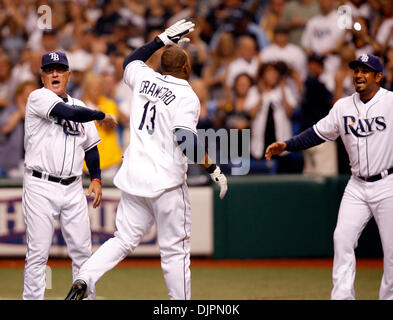 Tampa Bay Rays' Carl Crawford, left, wears the uniform of the Jacksonville  Red Caps of the Negro League during a baseball against the Pittsburgh  Pirates in Pittsburgh Saturday, June 28, 2008.(AP Photo/Gene