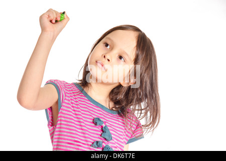 Ragazza giovane con la scrittura di un marcatore verde su una lavagna virtuale Foto Stock