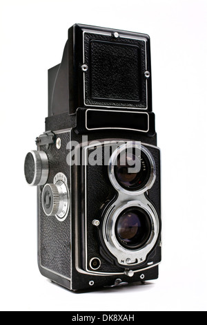 Un vintage Fotocamera su uno sfondo bianco. Foto Stock