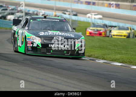 Agosto 13, 2011 - Watkins Glen, New York, Stati Uniti - NASCAR Nationwide conducente James Buescher in #30 auto durante la gara della mostra Zippo 200 al Glen (credito Immagine: © Mark Konezny/Southcreek globale/ZUMAPRESS.com) Foto Stock