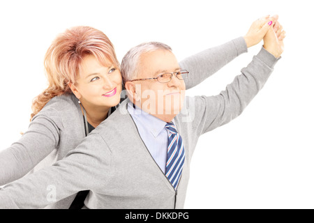 Amorevole Coppia di mezza età in posa Foto Stock
