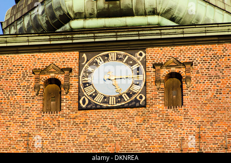 La chiesa grande orologio di sankt nikolaj chiesa a Copenaghen, Danimarca Foto Stock