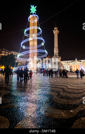 Le luci di Natale in Praça Dom Pedro IV, Lisbona, Portogallo, Europa Foto Stock