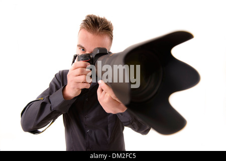 Fotografo professionista tenendo girato con una lente del telefono Foto Stock