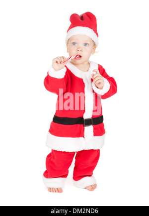 Baby santa con la caramella della canna da zucchero. Isolato su sfondo bianco Foto Stock