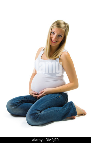 Bella bionda caucasica donna in stato di gravidanza Foto Stock