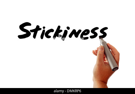 Primo piano di una mano a scrivere la parola appiccicosità (come in sticky contenuti online) con un marcatore, eventualmente per una strategia Internet. Foto Stock
