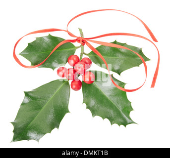 Holly con nastro rosso, decorazione di Natale Foto Stock