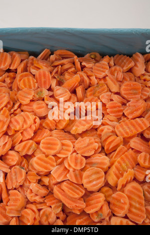 Prezzi di carota scambi Quantità per confezione di verdure pacchetto giallo rettangolare piccolo pezzo molti molti comprare vendere prodotto texture Foto Stock