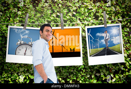 Immagine composita di sorridere casual uomo in piedi Foto Stock