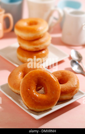 Ciambelle fatte in casa. Ricetta disponibile.. Foto Stock