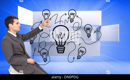 Immagine composita di imprenditore seduto e puntare il dito Foto Stock