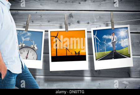 Immagine composita di sorridere casual uomo in piedi Foto Stock