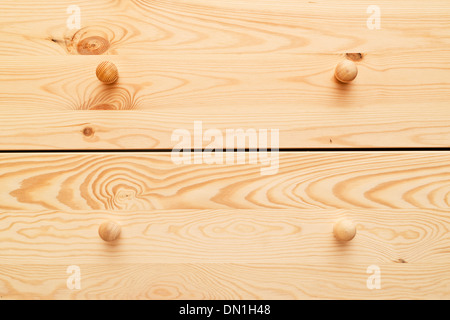 Cabinet in legno cassetti con dettagliate di legno naturale texture. L'arredamento della casa. Foto Stock