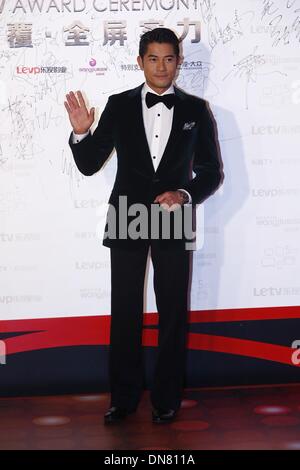 Pechino, Cina. Xix Dec, 2013. Aaron Kwok pone per la telecamera in corrispondenza del quarto LETV Cerimonia di premiazione a Pechino in Cina il giovedì 19 dicembre, 2013. © TopPhoto/Alamy Live News Foto Stock