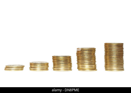 Torri da con delle monete su sfondo bianco Foto Stock