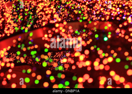 Di notte le luci di colore - Feste decorazioni - sfondo di Natale Foto Stock