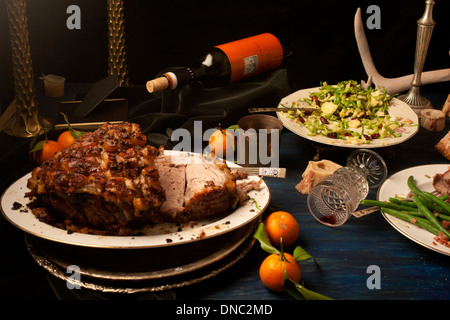 Arrosto di maiale dopo cena math still life Foto Stock