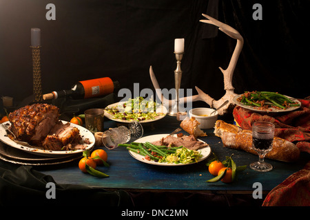 Arrosto di maiale dopo cena math still life Foto Stock