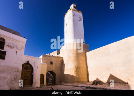 Minareto e ex Portugese lighthouse, El Jadida, Marocco Foto Stock
