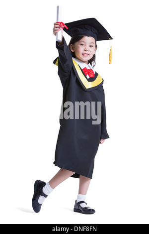 Ragazza carina in abito di graduazione Foto Stock