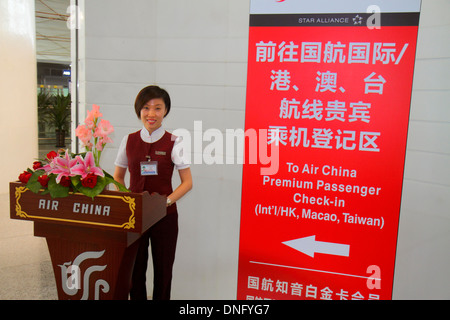 Pechino Cina,Cinese,Aeroporto Internazionale di Pechino Capital,PEK,Terminal 3,contatore,caratteri cinesi hànzì pinyin,interno,Air China,check-in, Foto Stock