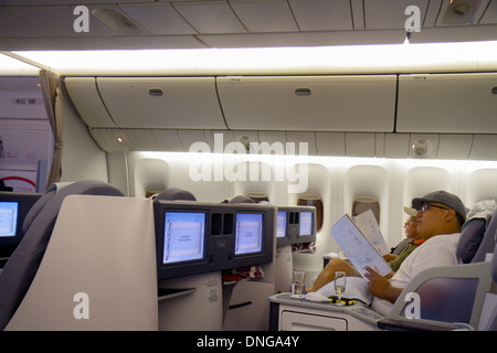 Texas,Houston,TX,Southwest,George Bush Intercontinental Airport,IAH,Air China,volo per Pechino,a bordo,cabina passeggeri,classe,cabina passeggeri,m asiatico Foto Stock