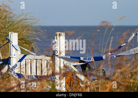 Case distrutte dopo picchi di marea a Hemsby nel dicembre 2013 Foto Stock