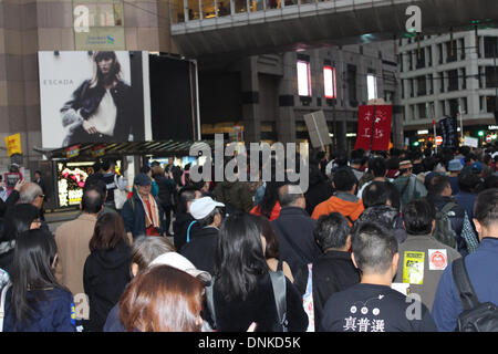 Hong Kong, Cina. Il 1 gennaio 2014. Pro-democrazia dimostranti prendere parte in un giorno di Capodanno nel rally di Hong Kong del quartiere degli affari di credito: Robert Kemp SC/Alamy Live News Foto Stock