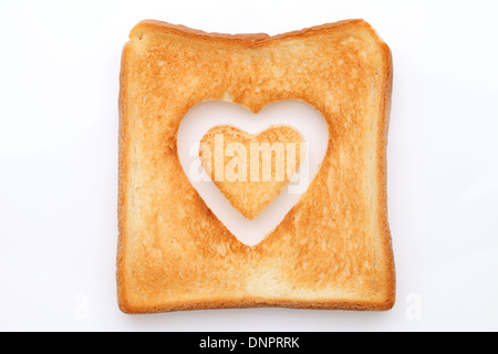 Tostate fette di pane con il foro forma di cuore Foto Stock