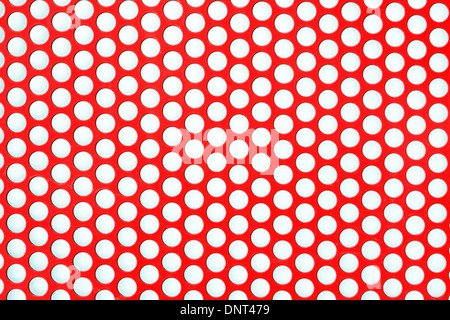 Finitura metallica con cerchi e fori Foto Stock