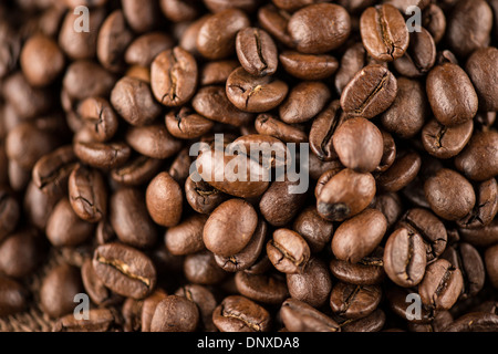 Loose pila di materie i chicchi di caffè. Foto Stock