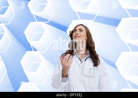 Immagine composita di felice medico gettando apple Foto Stock