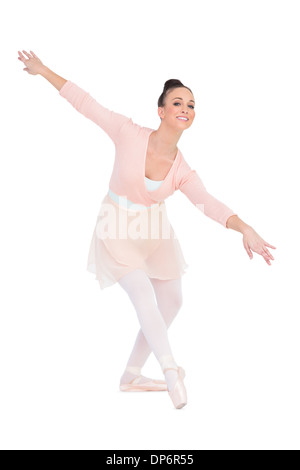 Wow, la sua incredibile. Ritratto della bellissima ballerina donna in  costume blu con il trucco in piedi contro lo sfondo grigio guardando la  fotocamera. l'emozione di un Foto stock - Alamy