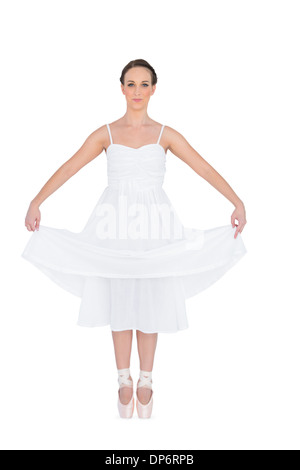 Tranquillo giovane ballerina in piedi sul suo tiptoes Foto Stock