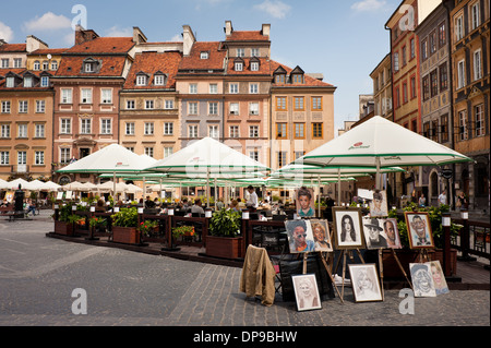 Dipinto ritratti umani su schede di Varsavia Foto Stock