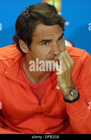 Melbourne, Australia. Xi gen, 2014. Roger Federer reagisce durante la conferenza stampa in vista del Australian Open di tennis nel torneo di Melbourne, Australia, 11 gennaio 2014. Credito: Xu Yanyan/Xinhua/Alamy Live News Foto Stock